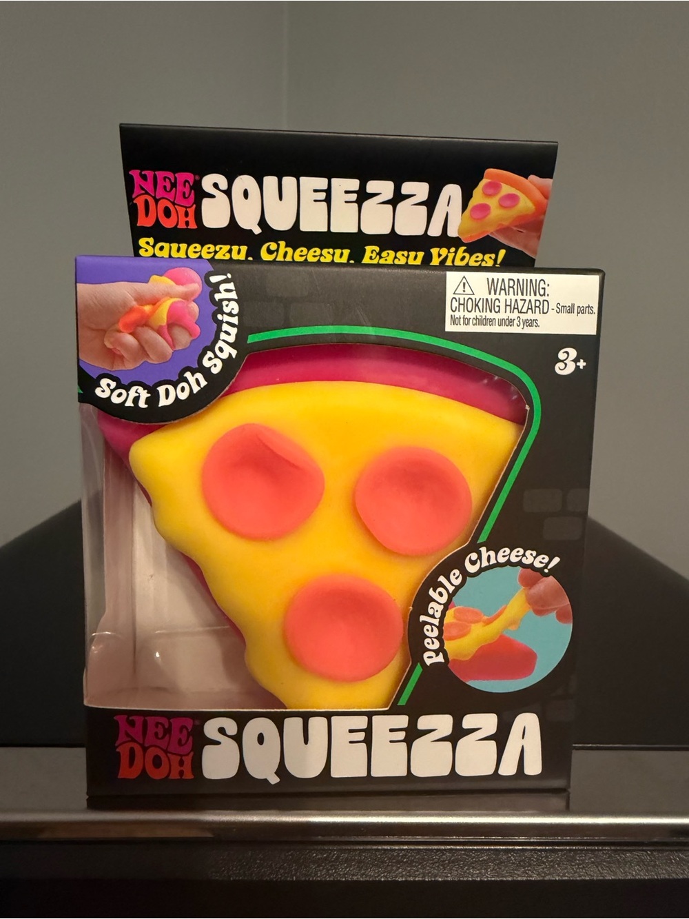 Nee Doh Squeeza Pizza Slice Kids Toy - Yellow with Pink Toppings